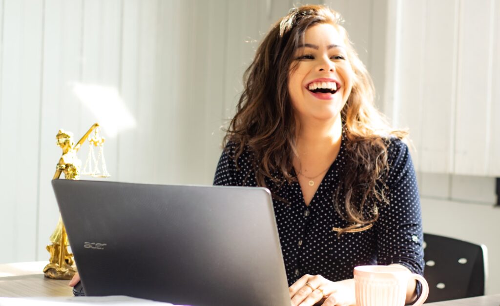 woman happy with her groove funnels page builder